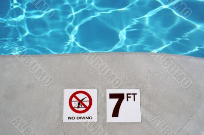 Swimming pool depth marker