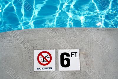 Swimming pool depth marker