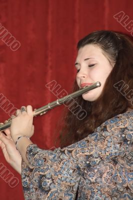 Woman playing flute