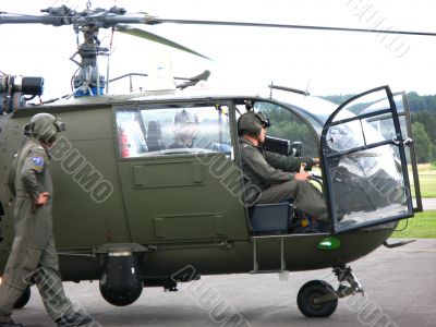 military helicopter on the airfield