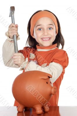 adorable boy breaking the money box