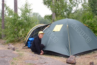 Elderly woman in camping