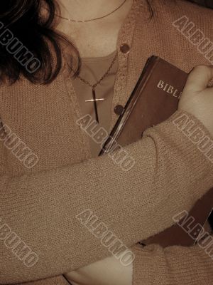 Holding the Bible Holding the Bible