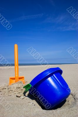 Beach spade and bucket