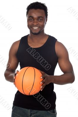 attractive young person with basketball ball