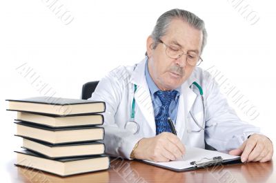 seniors doctor writing