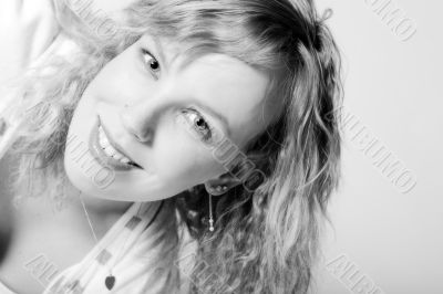 Portrait of a beautifull curly blond