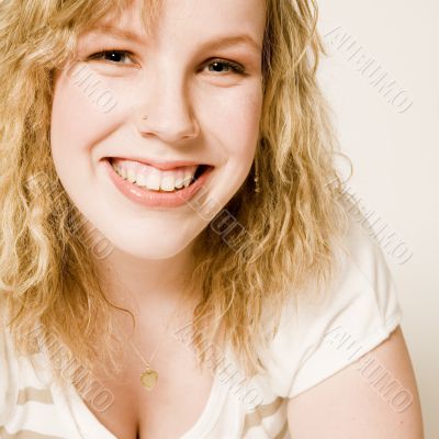 Portrait of a beautifull curly blond