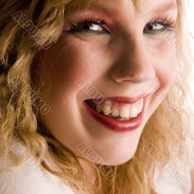 Portrait of a beautifull curly blond