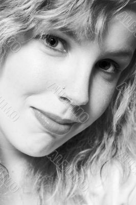 Portrait of a beautifull curly blond