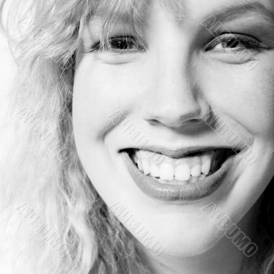 Portrait of a beautifull curly blond