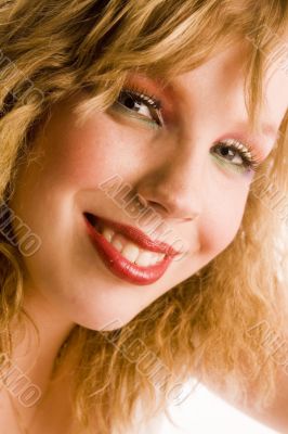 Portrait of a beautifull curly blond