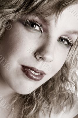 Portrait of a beautifull curly blond