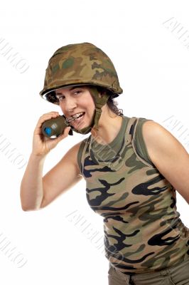 Soldier girl holding a hand grenade Soldier girl holding a hand grenade