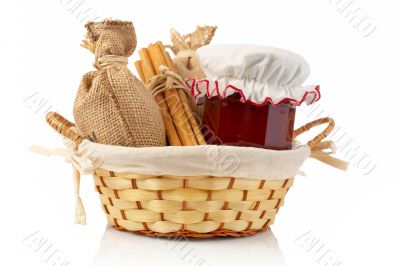 Jam jar, sticks of cinnamon and burlap