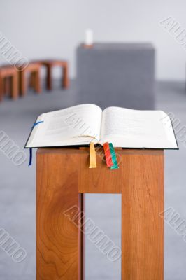 Open Bible on Wooden Console