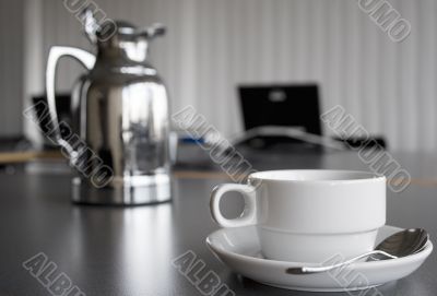Cup and Coffee Pot on Desktop
