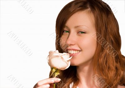 A smiling girl and white rose