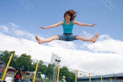 jumping on a trampoline