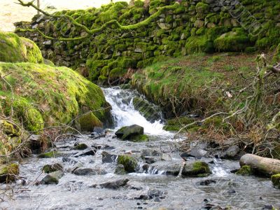 Waterfall and stone wall