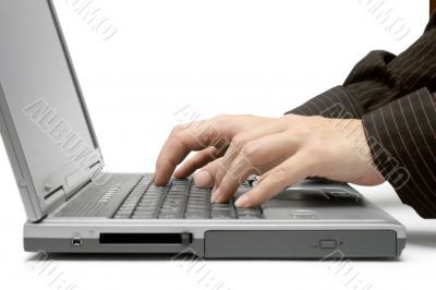 Typing on a Grey Laptop. Typing on a Grey Laptop.