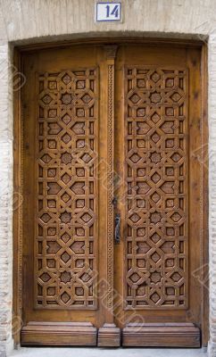 Medieval carved door with number