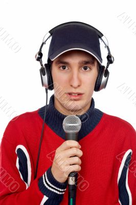 Disc jockey with headphones and microphone