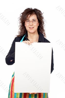 Housewife in apron holding the blank poster