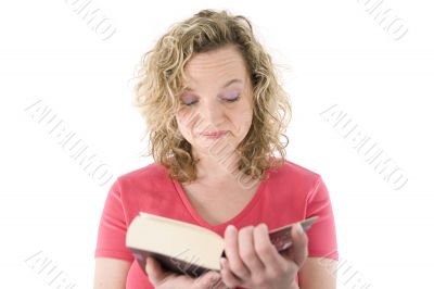 Attractive blonde reading a book