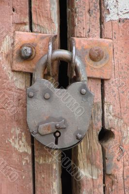 Wintage rusty metal gate padlock