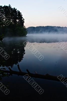 Morning fog above lake