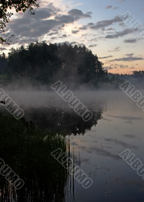 Morning fog above lake