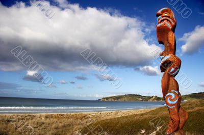 Maori carving guarding Omaha beach