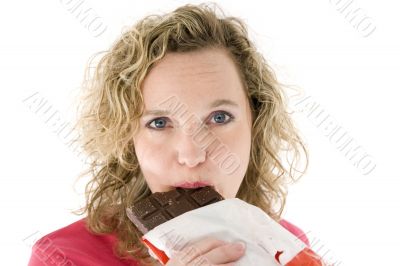 Young blond girl sneezing in the handkerchief