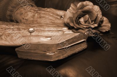 Senior hand on a bible