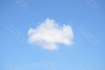 White cloud in the dark blue sky