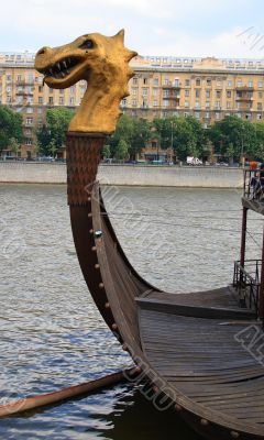 Gold head of a dragon on an old vessel