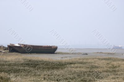 Abandoned river barge