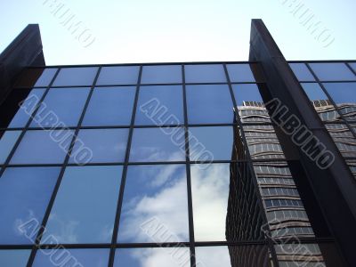 Building Reflected with Pale Blue Sky