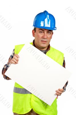 Construction worker holding the blank poster
