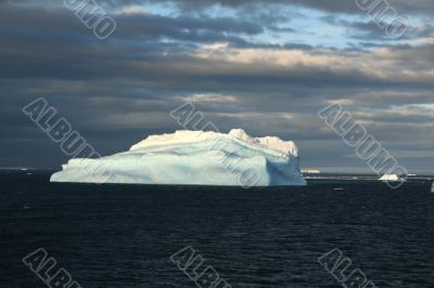 Iceberg with surrealistic blue swirls