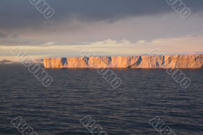 Sunset with tabular iceberg