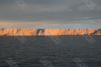 Sunset with tabular iceberg