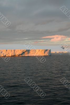 Sunset with tabular iceberg