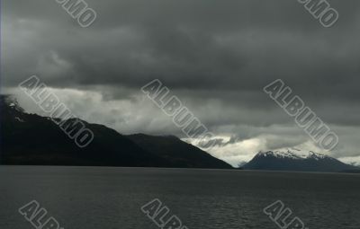 Ominous dark clouds and black ridges