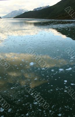 Abstract, brash ice forming at sundown