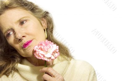 Older woman with flower