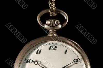 Old pocket watch on black detail Old pocket watch on black detail