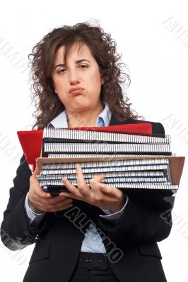 Busy business woman carrying stacked files