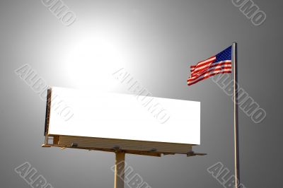 Billboard and American Flag with sun behind